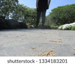 Man in the Middle of a Path
