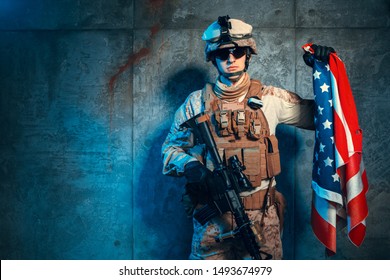 Man Military Outfit A Mercenary Soldier In Modern Times With US Flag In Studio