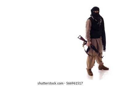 Man In Military Outfit Warrior Mujahedin In Modern Times On A White Background In Studio