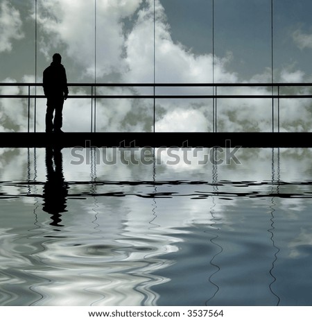 man in the modern building, with reflection