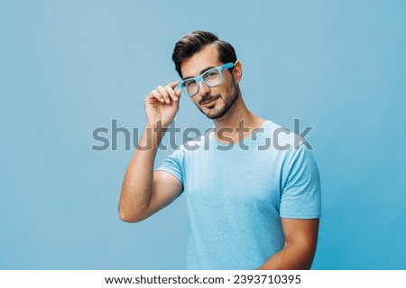 Man modern portrait style blue beard t-shirt background trendy attractive fashion lifestyle glasses smile