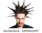 A man with a mohawk and beard, isolated