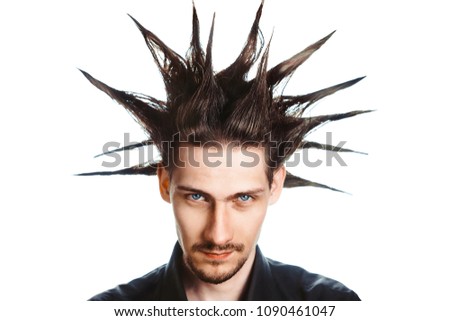 A man with a mohawk and beard, isolated