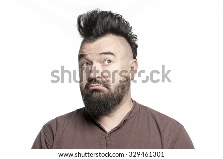 A man with a mohawk and beard, isolated