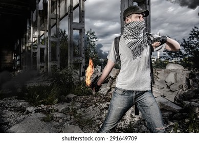 Man with Molotov cocktail - Shutterstock ID 291649709