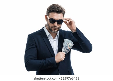 Man with money cash. Dollar banknotes. Portrait of businessman holding money banknotes. Dollar bills, credit, online banking. Rich man pointing at dollar banknotes, bank loan, financial savings.