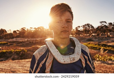 Man, motocross rider or portrait for extreme sport in nature, confident or skill in driving with speed. Man, pride face or gear for motorcycle or off road action or danger with fast vehicle in wood - Powered by Shutterstock