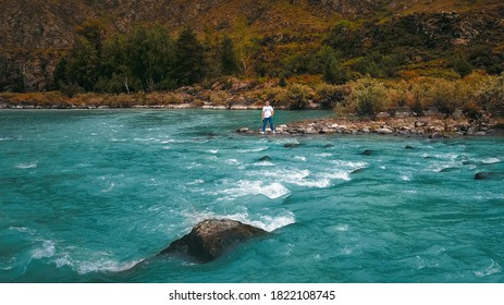 The man at the mountain river