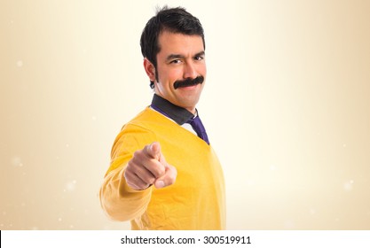 Man With Moustache Pointing To The Front 