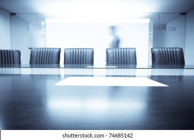 man move in Meeting room