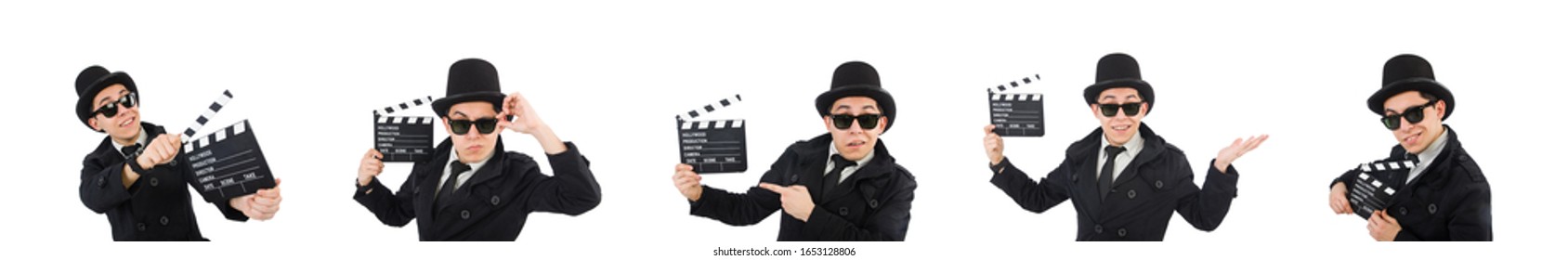 Man with movie clapper isolated on white - Shutterstock ID 1653128806
