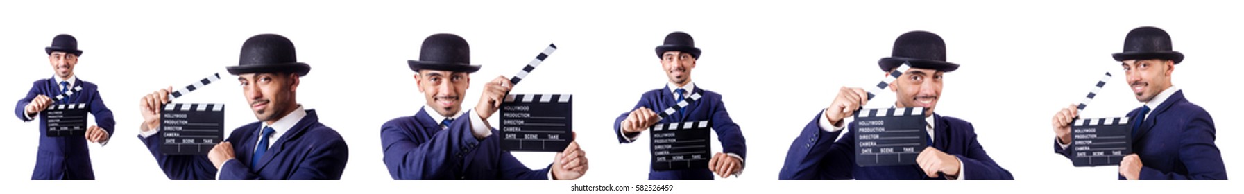 Man with movie clapper isolated on white - Shutterstock ID 582526459