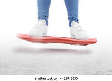 Man Moving On Red Hover Board Scooter Isolated. Smart Hoverboard Movie Scoter. No Wheel Futuristic Transport Device. Future Transportation Technology. Driver. Person Ride Antigravity Levitation 