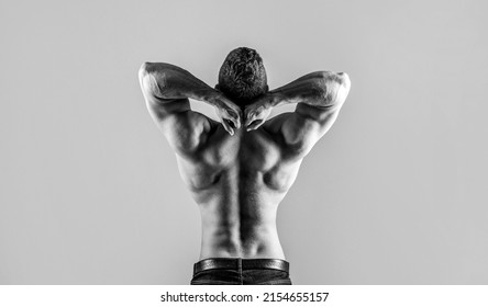 Man with muscular arms, triceps. Waist, waistline. Guy with beautiful torso. Black and white.