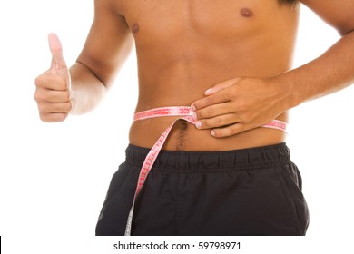 Man With A Muscular Body Measuring His Abs - Lose Weight Series