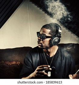 Man In Music Studio Smoking Weed