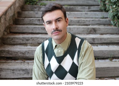 Man With A Mustache Wearing Sleeveless Rhombus Sweater