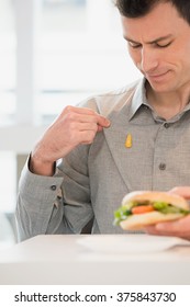 Man With Mustard On His Shirt