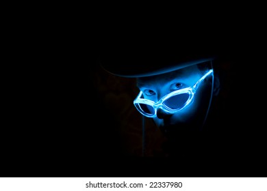 Man In Neon Glasses