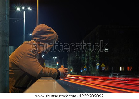 A man at night, Wroclaw, Poland.