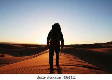 Man observer  sand desert
