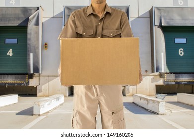 Man Offering His Goods Transportation Service From Loading Bay For Trucks 