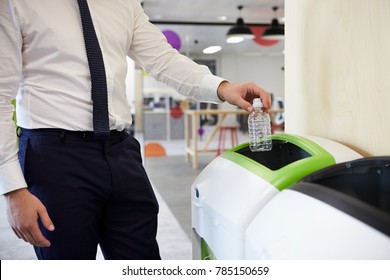 Man In An Office Recycling Plastic Bottle, Close Up