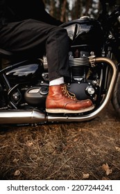 Man In Old Brown Boots On A Motorcycle. Vintage Poster. Moto Wallpaper
