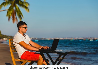 Man On Beach With Laptop, Vietnam, Mui Ne