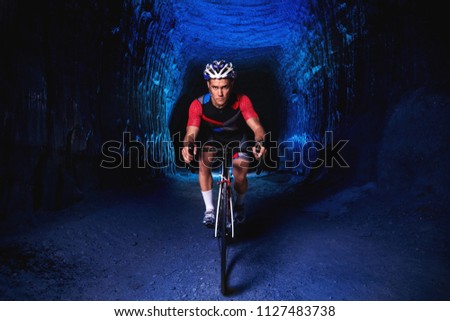 Similar – Man on bicycle preparing for triathlon race