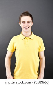 Man On Black Background In Polo Shirt