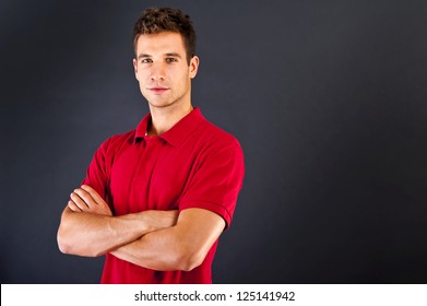 Man On Black Background In Red Shirt With Smile