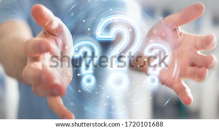 Man on blurred background using digital question marks holographic interface 3D rendering