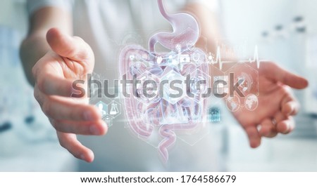 Man on blurred background using digital x-ray of human intestine holographic scan projection 3D rendering
