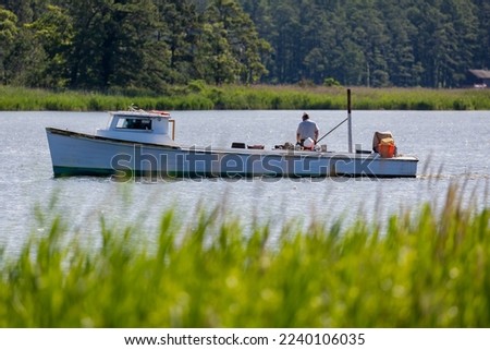A man on a crabbing boat, Kent Island, Chesapeake Bay