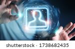 Man on dark background using digital blue holographic user interface 3D rendering