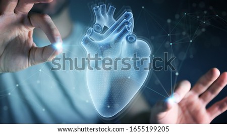 Man on dark background using digital x-ray of human heart holographic scan projection 3D rendering