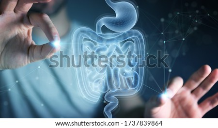 Man on dark background using digital x-ray of human intestine holographic scan projection 3D rendering