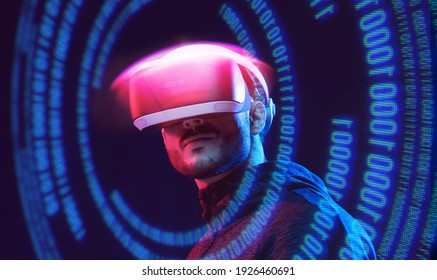 Man on dark virtual reality background. Guy using VR helmet. Augmented reality, future technology, game concept. Blue neon light. Futuristic holographic interface to display data. - Powered by Shutterstock