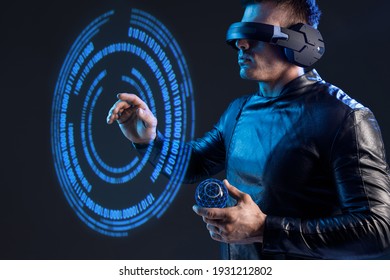Man on dark virtual reality background. Guy using VR helmet. Augmented reality, future technology, game concept. Blue neon light. Futuristic holographic interface to display data.