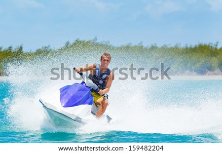 Man on Jet Ski having fun in Ocean