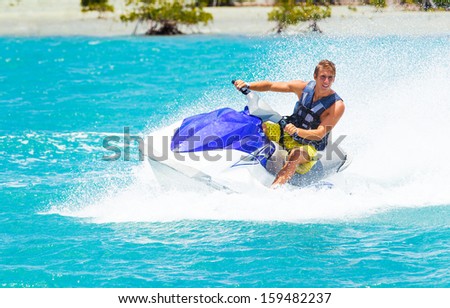 Man on Jet Ski having fun in Ocean