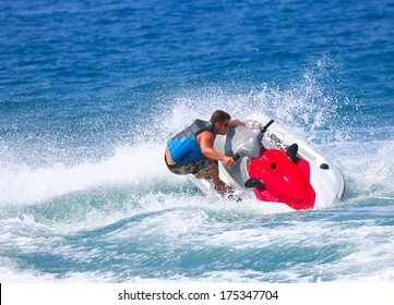 Man On Jet Ski Jump On The Wave 