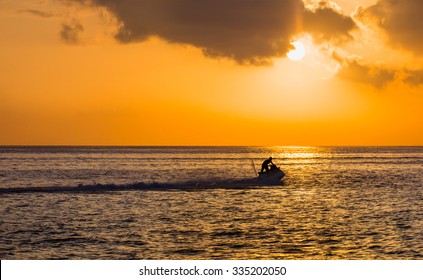 Man On Jet Ski Jump On The Wave