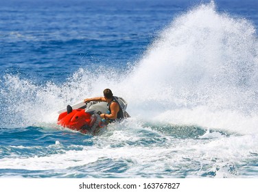 Man On Jetski Jump On The Wave