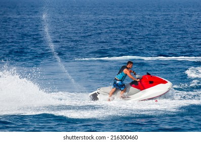 Man On Jetski Jump On The Wave 