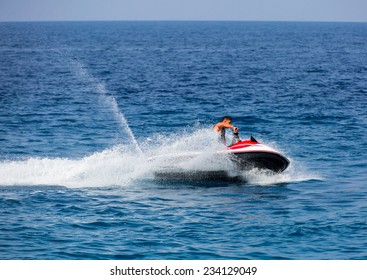 Man On Jetski Jump On The Wave