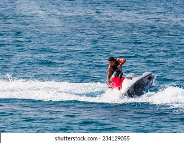 Man On Jetski Jump On The Wave