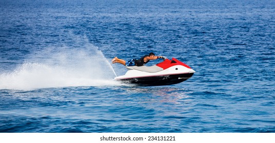 Man On Jetski Jump On The Wave 