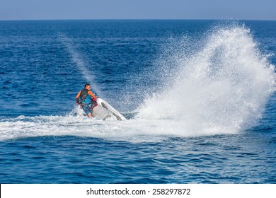 Man On Jetski Jump On The Wave